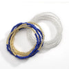 Three strands of colorful belly bead chains in blue, gold, and silver are displayed on a white background.