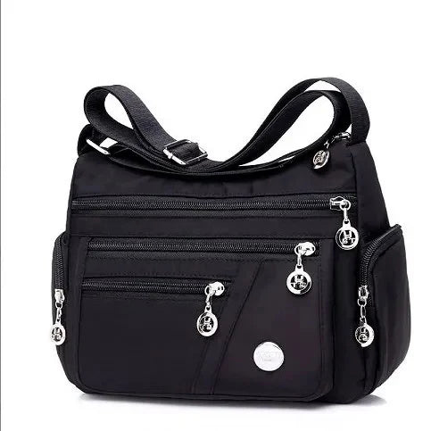 Black waterproof nylon crossbody tote bag for women with multiple pockets