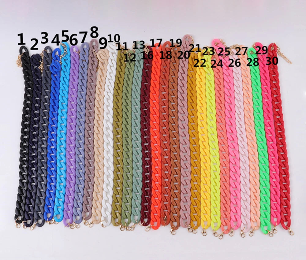 A display of colorful acrylic link chains, numbered 1 through 30, arranged in a row.
