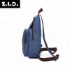 A dark blue canvas backpack with brown straps shown against a white background.
