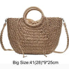 Handwoven straw moon bag in beige with a top handle