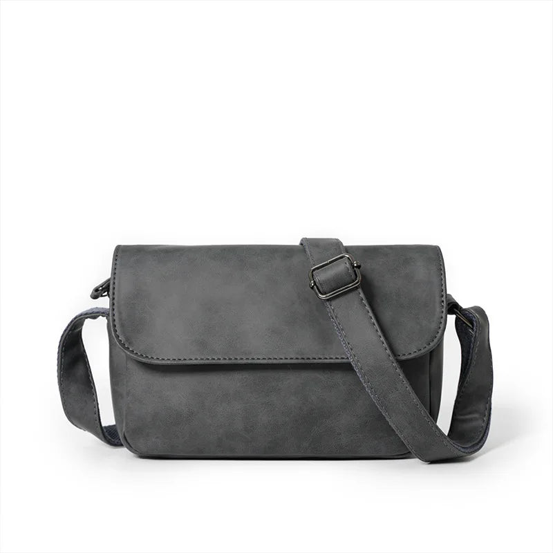 A dark gray retro PU leather crossbody shoulder bag with a flap and adjustable strap.