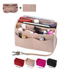 A beige felt cosmetic organizer pouch shown with various makeup and accessories inside, alongside several colored fabric pouc