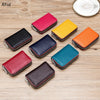 A collection of genuine leather accordion card holder wallets in various colors including red, black, blue, orange, and green