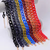 A display of colorful acrylic link chain necklaces in various shades including black, blue, green, yellow, orange, and red.