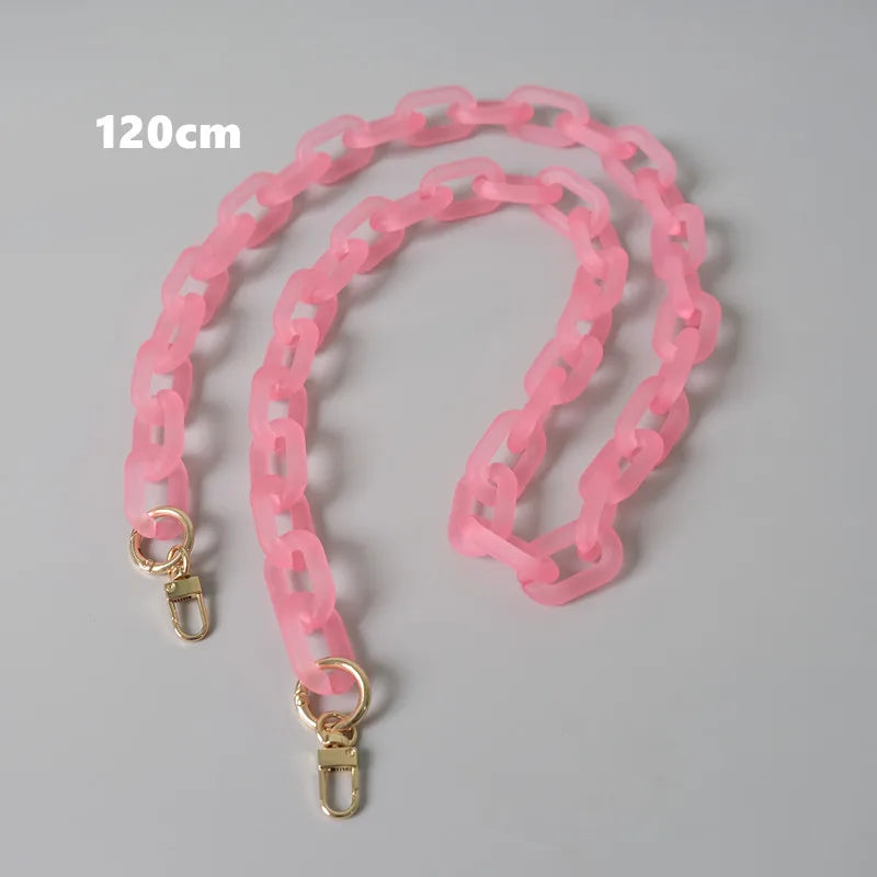 Pink adjustable detachable chain shoulder bag with a 120cm length displayed on a gray background.