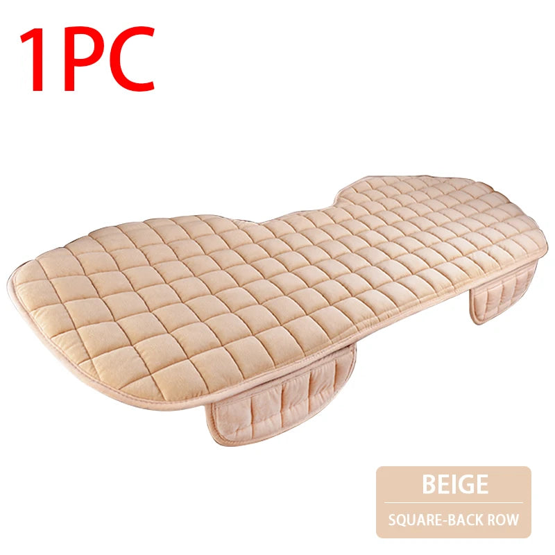 One beige square-back row plush car seat cover for soft anti-slip protection.