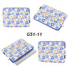 A colorful floral patterned laptop sleeve in blue and white for a MacBook Pro.