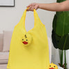 Sac de shopping jaune, pliable et écologique, avec un visage de canard.