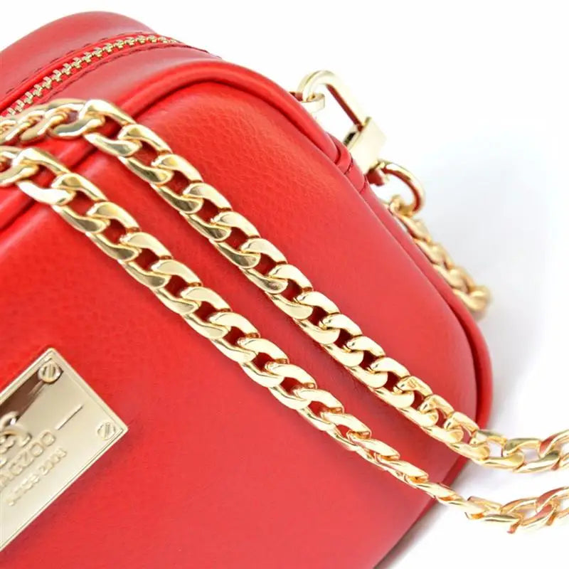 A red leather bag featuring a gold-tone metal chain strap and clips.
