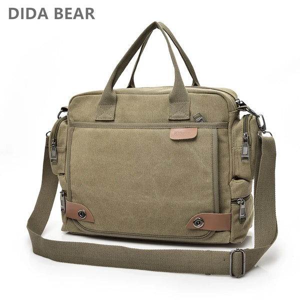 A tan canvas crossbody messenger bag with brown leather accents shown from the back.