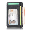 A black leather card holder wallet with a green sleeve and a yellow pen inside.