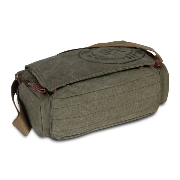 A dark olive green canvas messenger bag with brown leather trim and a woven logo detail.