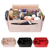 A set of collapsible felt cosmetic organizer pouches in beige, black, and red.