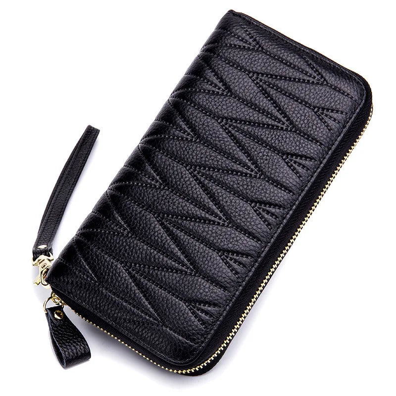 Black genuine leather RFID women's travel wallet with a zipper closure