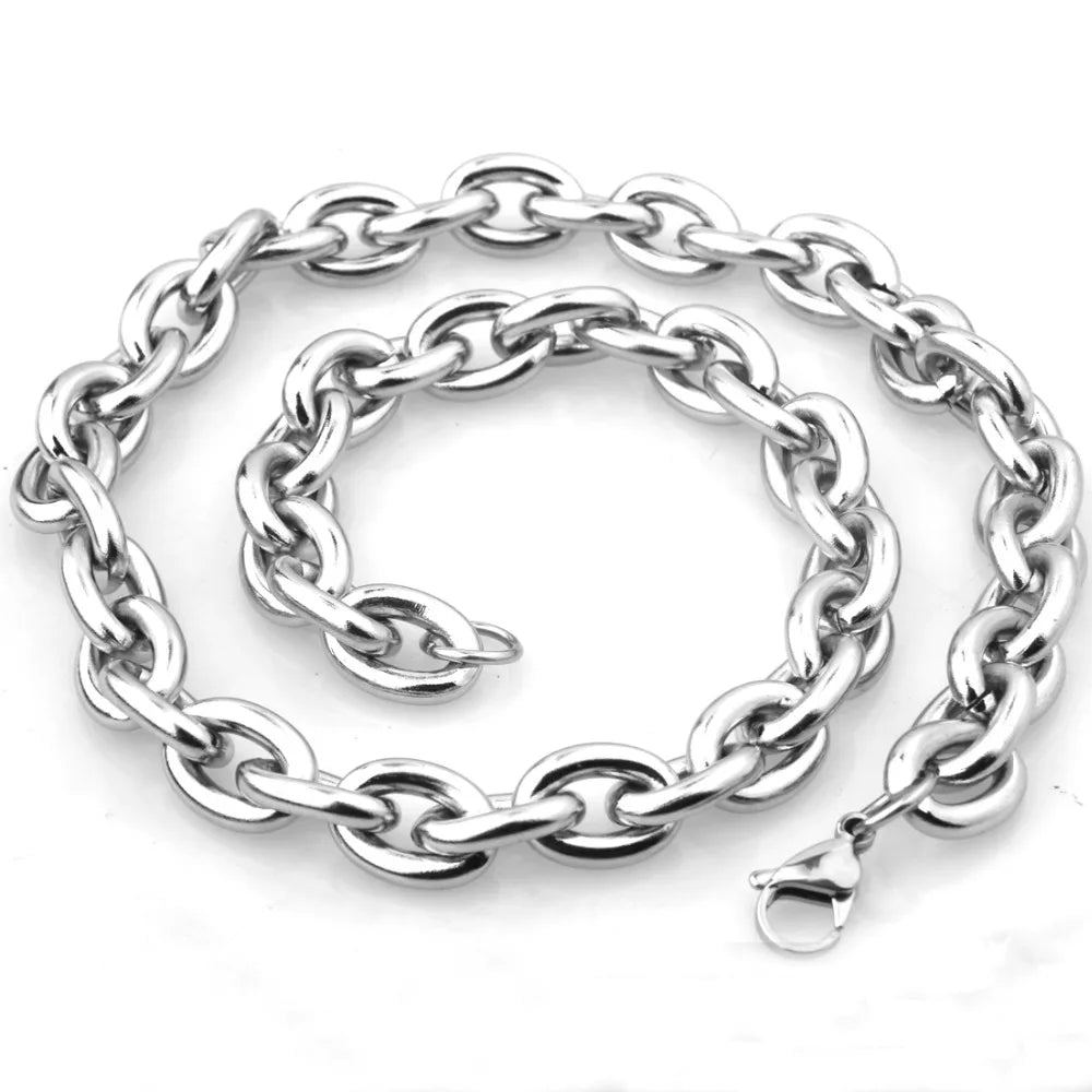 A silver stainless steel rolo link chain necklace laid out on a white background.