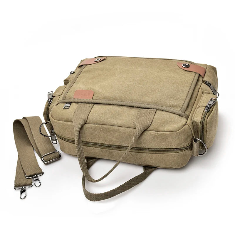 A tan canvas crossbody messenger bag with brown leather accents shown from above.