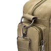 A close-up of a tan canvas crossbody messenger bag featuring brass hardware and zippered pockets.