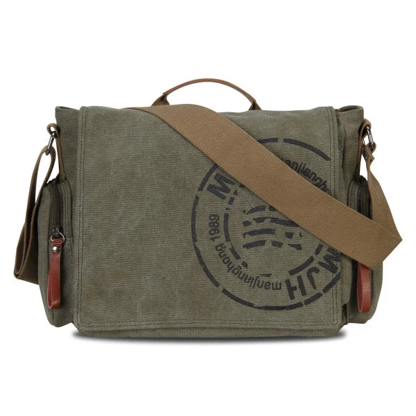 A dark olive green canvas messenger bag with brown leather straps and stitching.