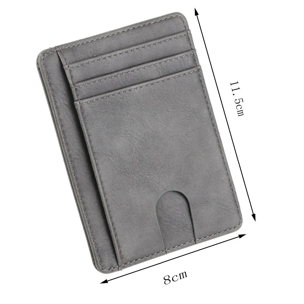 A gray slim leather wallet with multiple card slots and a cutout for cash, shown from the top view.
