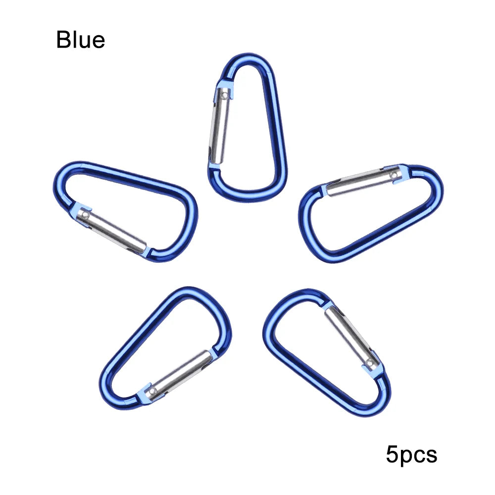 Five blue aluminum carabiner key rings shown individually against a white background.
