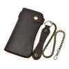 A dark brown genuine leather bifold wallet with a metal chain attached.