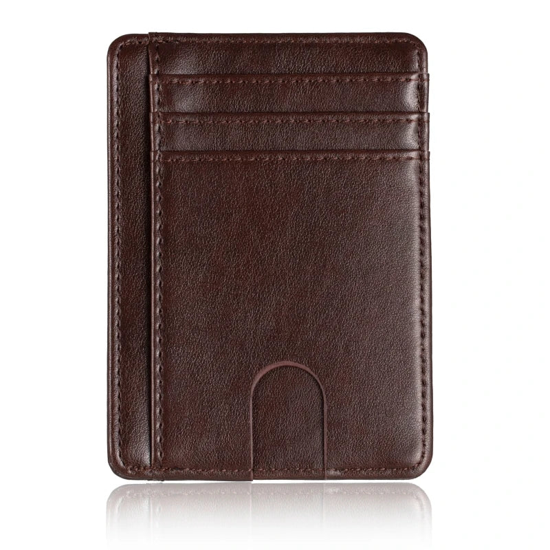 A dark brown leather card holder wallet with stitched lines and a slot for cards.