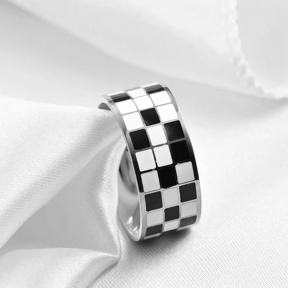 Silver dome rings featuring a black and white checkerboard pattern on the band
