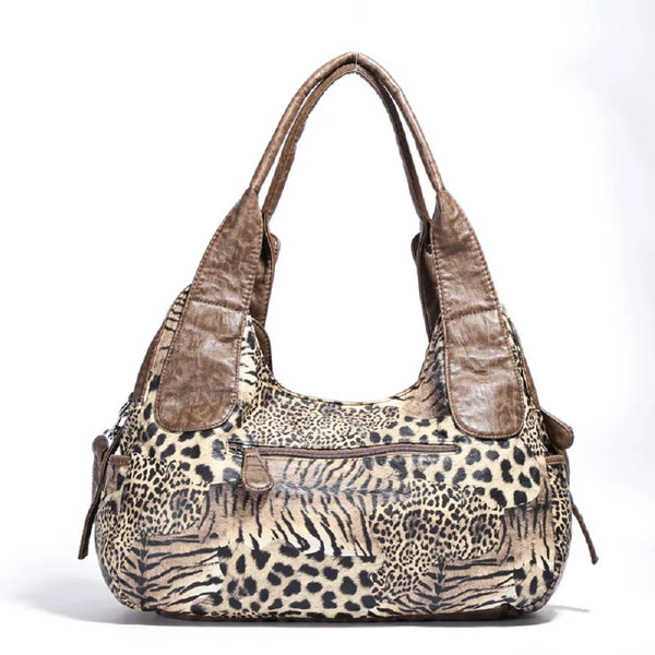 A brown leopard print shoulder bag with a textured leather finish.