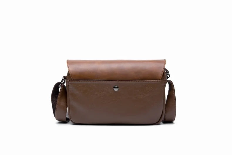 A brown retro PU leather crossbody shoulder bag for men shown flat on a white background.