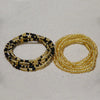 Two strands of colorful belly bead chains, one black and gold, and one solid gold color.