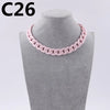 A pink acrylic link chain necklace displayed on a mannequin neck.