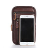 A brown genuine leather crossbody phone pouch with a flap and hardware, shown against a white background.