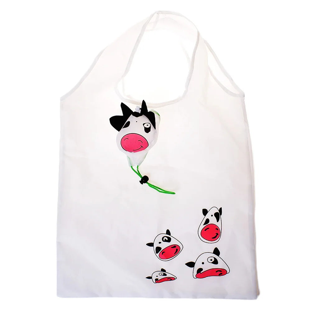 Sac de shopping cartonné blanc et écologique avec un visage de vache noir et blanc.