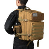 A tan tactical backpack with a black shirt and American flag patch visible on the front.