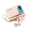 A pink compact PU leather zip wallet with a keychain featuring multiple colored cards.