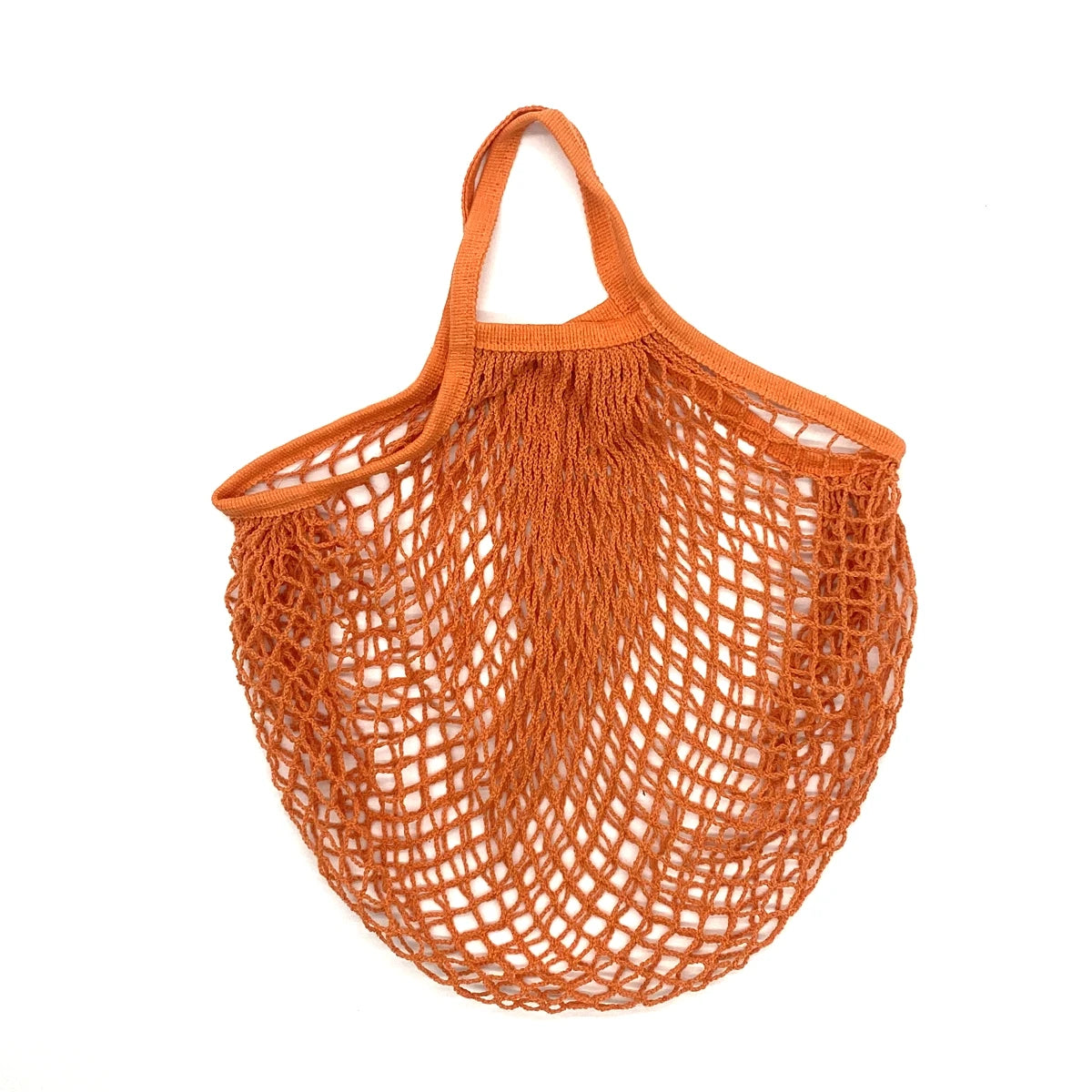 A woven orange organic cotton mesh grocery tote bag with a drawstring top.