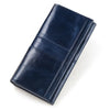 A dark navy genuine leather clutch wallet folded and displayed on a white background.