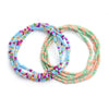 A set of colorful belly bead chains featuring pink, blue, and green beads for body jewelry.