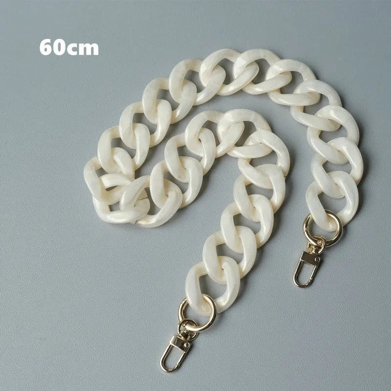 Bolsa de cadena de resina blanca de 60 cm con cierre y eslabones ajustables.