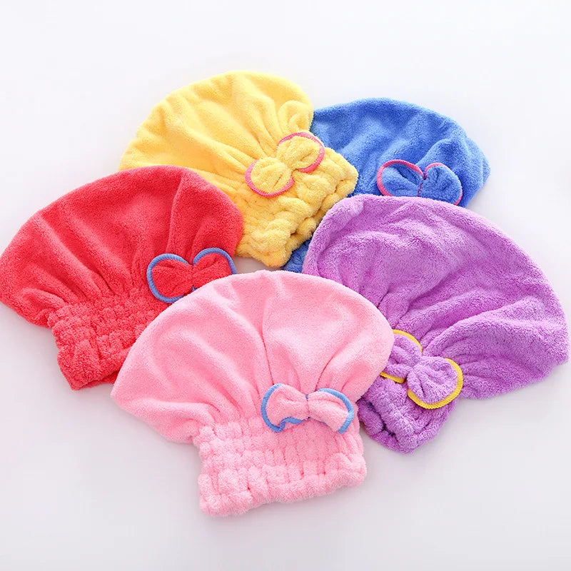 Colección de toallas y pañuelos de microfibra con lazo, en amarillo, azul, rojo y morado.