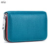 A teal leather accordion card holder wallet with a silver zipper and striped lining.