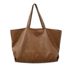 A brown oversized PU leather tote bag with a handle is shown from the front.