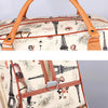 A close-up of a tan PU leather travel duffel bag featuring a vintage Paris theme with Eiffel Tower and floral illustrations.