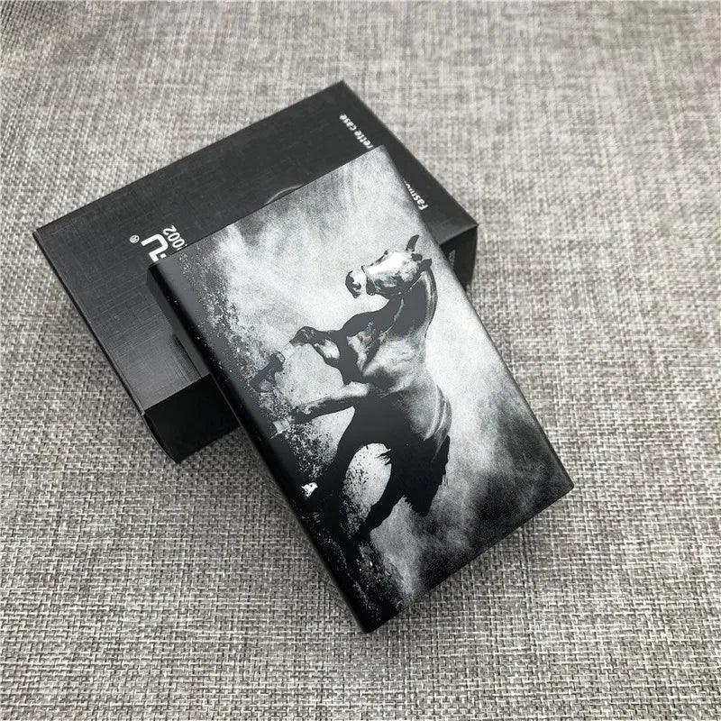 A black custom engraved cigarette case with a striking monochrome image of a bear.