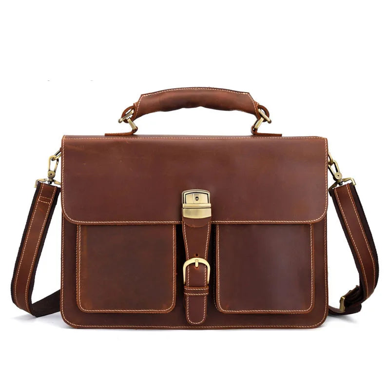 A brown vintage Crazy Horse leather briefcase with a top handle and flap closure.