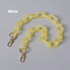 A light yellow adjustable detachable chain shoulder bag with a 60cm length displayed on a gray background.
