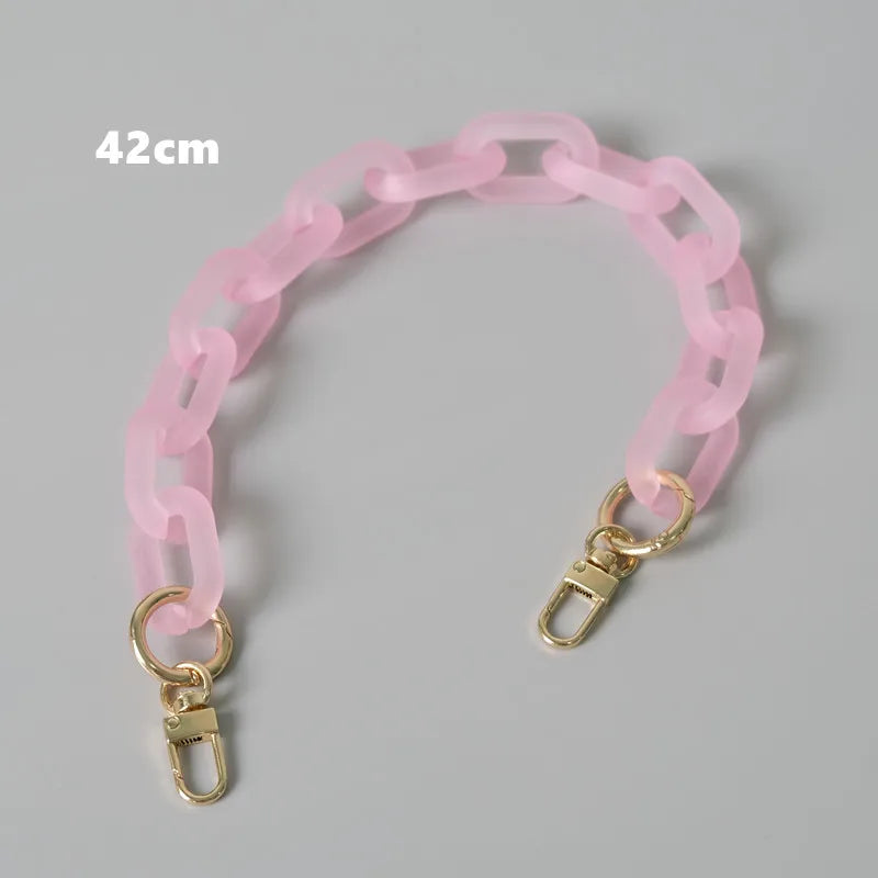A pink adjustable detachable chain shoulder bag with a 42cm length.