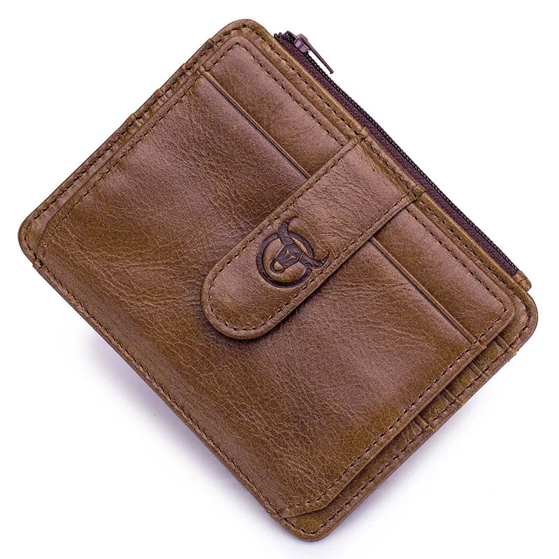 A brown genuine leather card holder with a stitched flap and embossed logo.