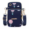 Navy waterproof nylon crossbody bag featuring pink and green striped hot air balloon designs